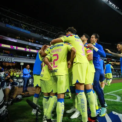 Alejandro Zendejas (C) of America celebrates with his teammates after scoring the team’s fourth goal during the 13th round match between America and Santos Laguna as part of the Torneo Apertura 2023 Liga MX at Azteca Stadium on October 21, 2023 in Mexico City, Mexico.